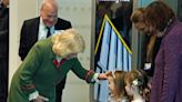 Queen Camilla Accepts Flowers from Little Girl in a Princess Crown at University of Aberdeen