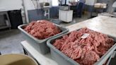 Amish butcher cuts meats to order in Adamsville