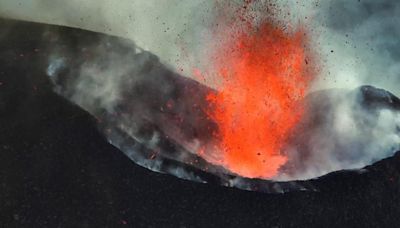 Rare footage shows powerful eruptions at peak of growing active volcano