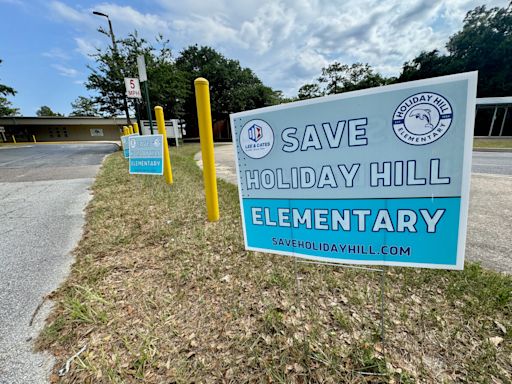 Mark Woods: Signs of the times — a neighborhood rallies to save the neighborhood school