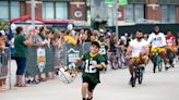 Fans come from near and far to kick off Green Bay Packers training camp, including return of bike tradition