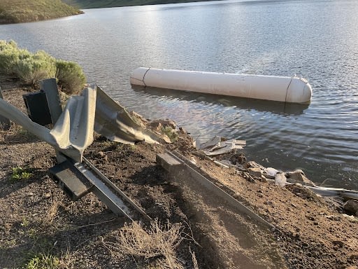 Jackknifed semi-truck crashes into Deer Creek Reservoir