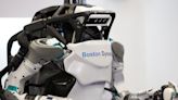 Elon Musk was likely inspired by Boston Dynamics' humanoid robot, its founder says