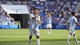 Argentina shakes off chaos of Morocco game by beating Iraq 3-1. Spain reaches Olympic quarterfinals