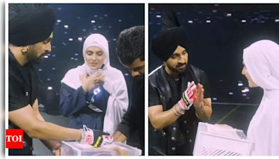 Diljit Dosanjh presents a gift to his Pakistani fan at his Manchester concert - Watch | - Times of India