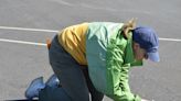 Naperville Eagle Scout project returns painted rose compass to Lansing airport taxiway