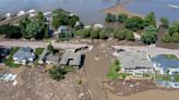 More rain possible in deluged Midwest as flooding kills 2, causes water to surge around dam