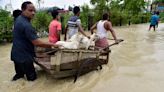 Tens of thousands of people take shelter in relief camps as heavy rains batter India’s northeast