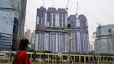 Hong Kong scraps property tightening measures to boost economic recovery