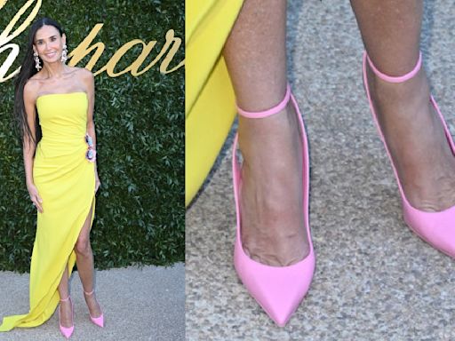 Demi Moore Brightens Up in Yellow Gown and Pink Louboutins at Chopard’s ‘Once Upon A Time’ Evening During Cannes...