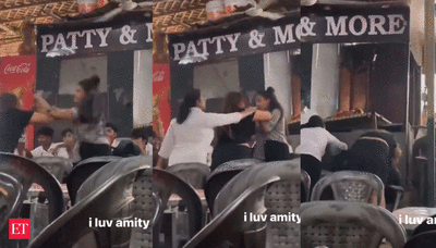 Watch: Two women beat each other in 'WWE-style fight' outside Amity University. What happened next shocked people! - The Economic Times