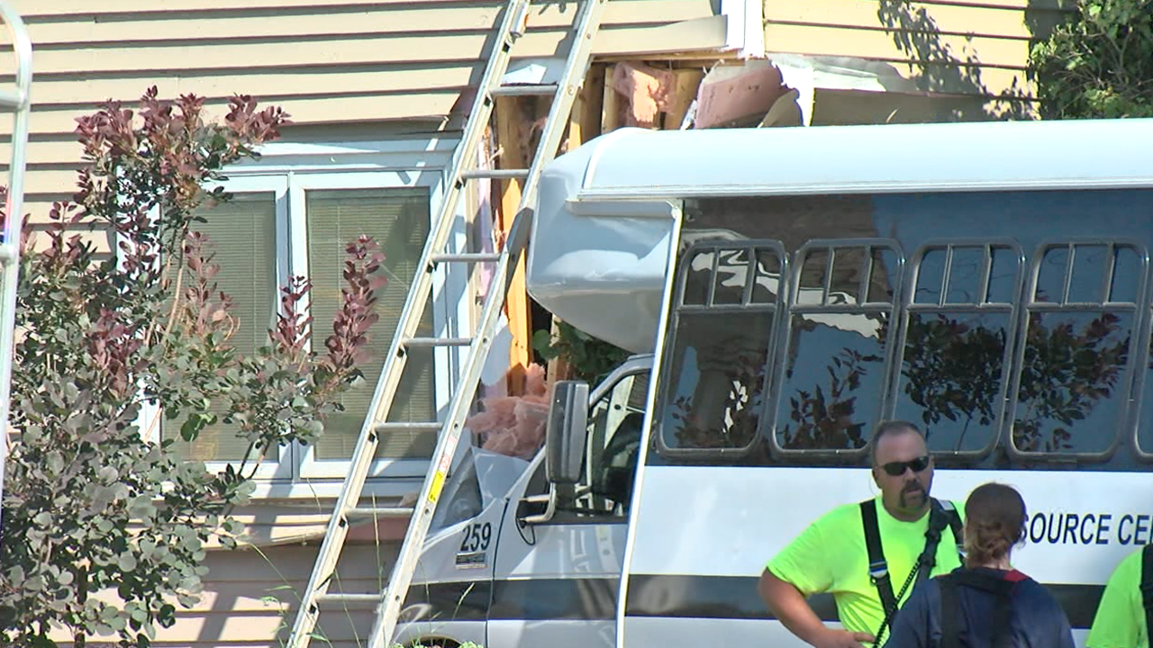 Eight injured after bus crashes through two fences and into a residence in Town of Sheridan