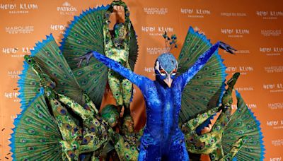 Heidi Klum has to deliver for her fans with Halloween costumes