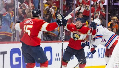 Florida Panthers right wing Vladimir Tarasenko celebrates with center Anton Lundell after scoring a goal against New York Rangers goaltender Igor Shesterkin in the...