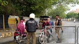 Pakistani police besiege Imran Khan's home as deadline for him to hand over suspects expires