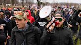 Anger at police, and hints of a plan, as Proud Boys marched toward Capitol