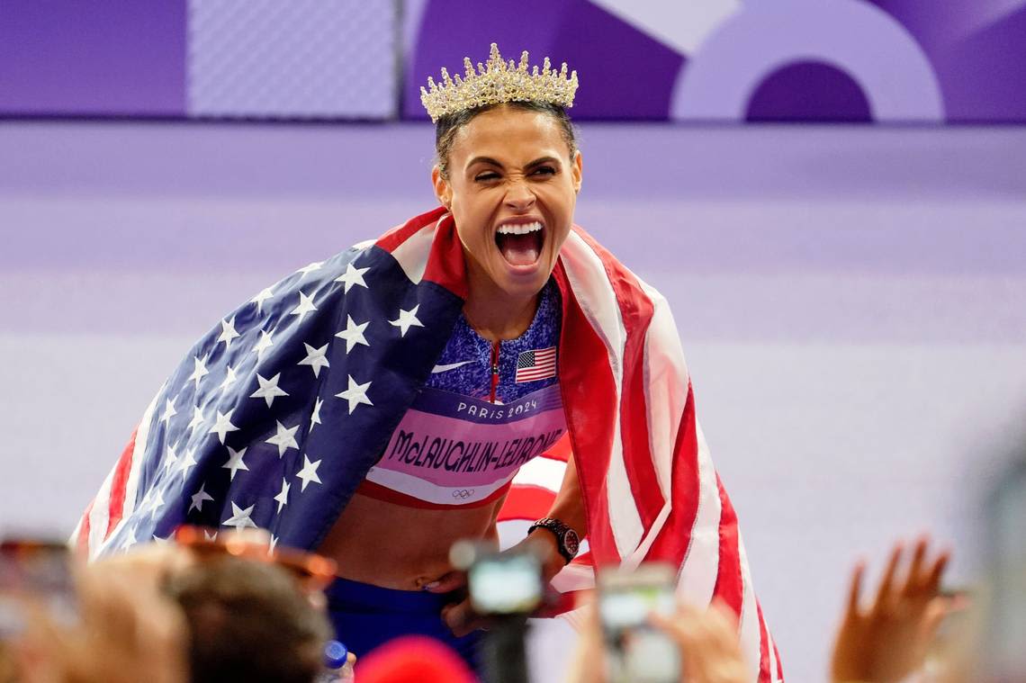 Former Kentucky star Sydney McLaughlin-Levrone breaks own world record for Olympic gold