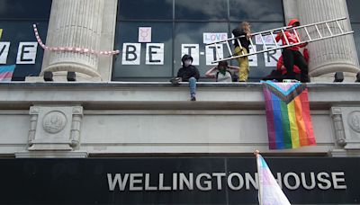 Young trans activists stage four-day protest on ledge of NHS England headquarters