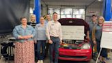 Arvest donation makes $5,000 donation to Higher Power Garage