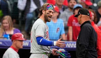 Rockies beat Phillies 3-2 in 11 innings after Philadelphia star Bryce Harper ejected in 1st