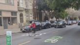 Street safety advocates install traffic signs, later removed by San Francisco crews