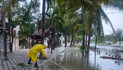 Beryl slams Mexico’s Yucatan Peninsula and is expected to regain hurricane strength before hitting US - Live