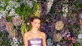 Millie Bobby Brown Is ‘Pool Ready’ in a Metallic Lavender Triangle swimsuit With Denim Shorts