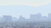 Why do air quality alerts often occur on hot days in Phoenix?