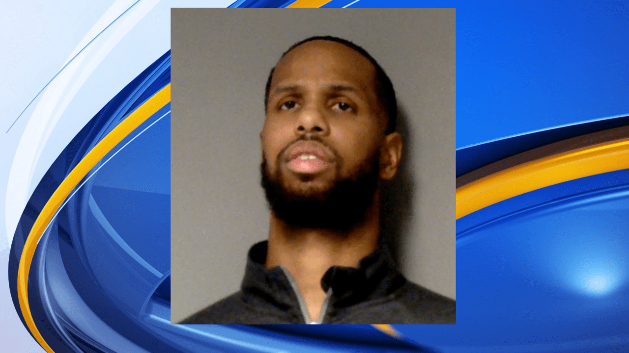 Troubled Holt basketball coach fired