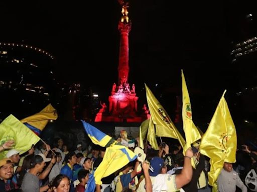 Aficionados del América pintan de azulcrema el Ángel de la Independencia; Torre BBVA también se ilumina