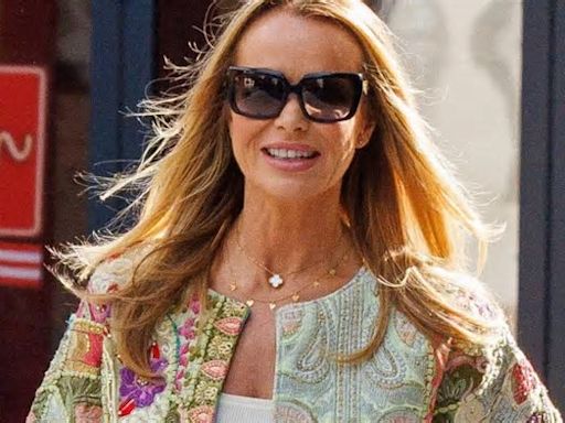 BGT judge Amanda Holden stuns as she goes braless in figure-hugging top – after laughing off Sharon Osbourne feud