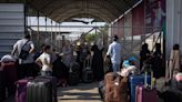 After weeks in besieged Gaza, some foreign nationals and wounded Palestinians are allowed to leave