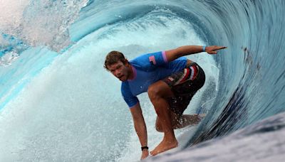 John John Florence advances to third round in Olympic surfing