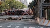 Twelve injured, including three firefighters, in NYC crane collapse blamed on engine fluid leak