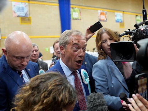 Nigel Farage promises to rid Reform of ‘bad apples’ during chaotic event