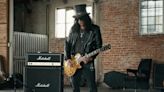 Slash Plays Guns N’ Roses Riffs in Humorous New Capital One Commercial: Watch