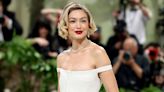 Gigi Hadid Goes Retro in a Floral White Tiered Dress at the 2024 Met Gala