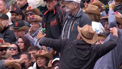 Fan ejected from Giants game for bizarrely tossing foul ball on field