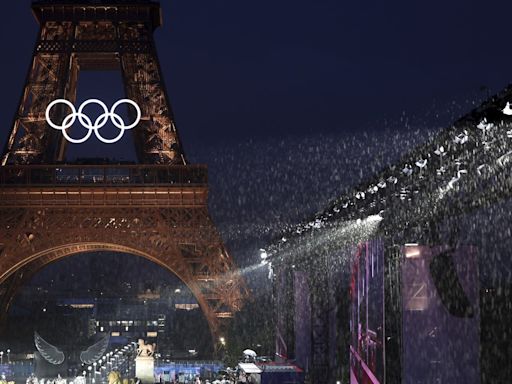 Paris dazzles with a rainy Olympics opening ceremony on the Seine River