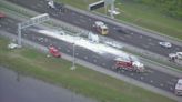 Overturned semi-truck blocks lanes on SR-417, scattering debris over the road: FHP