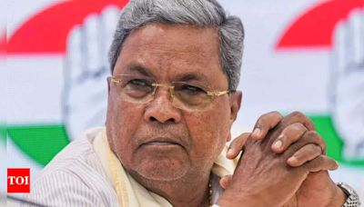 BJP releases papers to claim illegalities in Karnataka CM Siddaramaiah's wife case | India News - Times of India