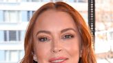 Lindsay Lohan Glows In A Shimmering, Silky Bronze Fit At A 2023 NYFW Show