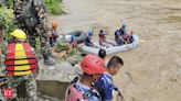 Rescuers in Nepal resume search for 51 people still missing from two buses swept away in mudslide - The Economic Times