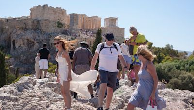 Greece shuts Acropolis, 2 firefighters killed in Italy as southern Europe swelters in a heat wave