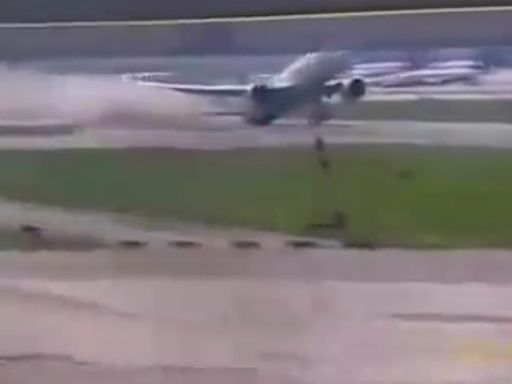 Moment packed Boeing 777 scrapes tail along Italian runway