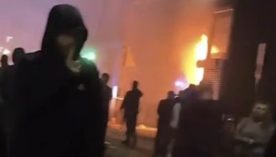 Thugs torch buildings in another devastating night of riots