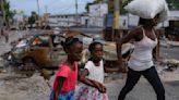 Haitians demand the resignation and arrest of the country's police chief after a new gang attack