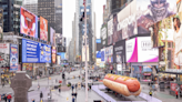 An enormous hot dog has taken up residence in the middle of Times Square