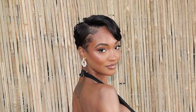 Jourdan Dunn sends pulses racing in a plunging sheer dress