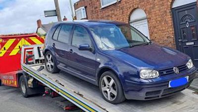 Away it goes: After more than six months this 'no tax' car is taken off the streets